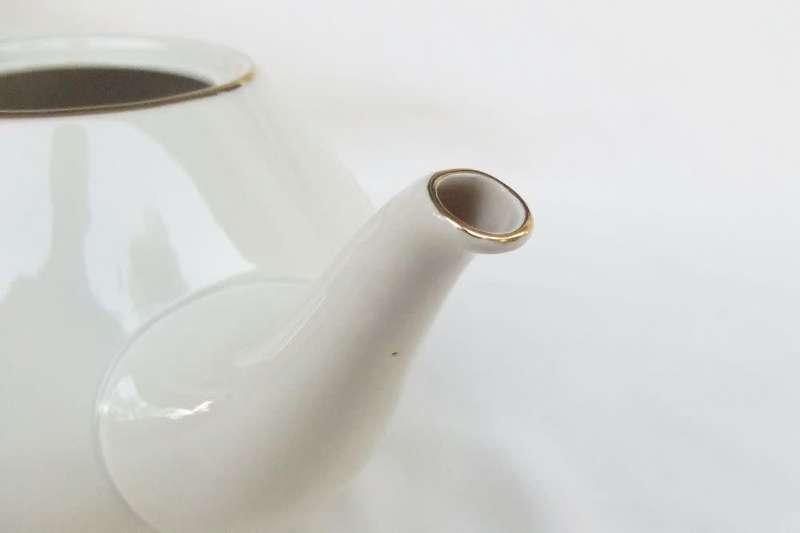 A stunning German porcelain teapot by Alka Bavaria in the Swallows pattern