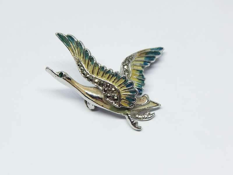 A lovely vintage 1950`s enamel Swan brooch by design house BJL set with marcasite
