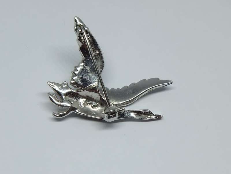 A lovely vintage 1950`s enamel Swan brooch by design house BJL set with marcasite