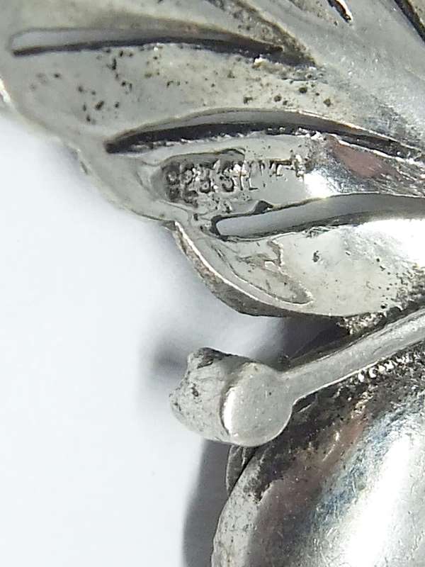 A magnificent vintage solid sterling silver leaf form brooch filled with marcasite
