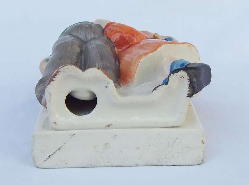 A very charming vintage Hummel look wall pocket or wall vase