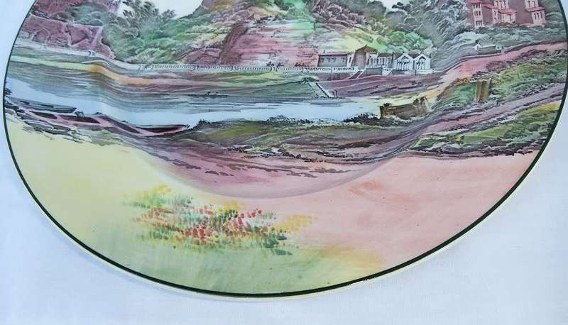 A stunning old cabinet or display plate depicting a castle scene made by Royal Doulton England