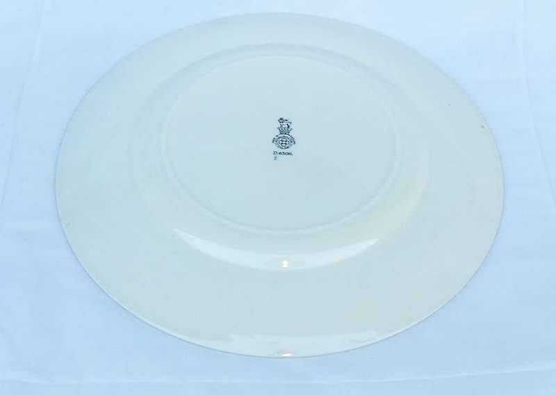 A stunning old cabinet or display plate depicting a castle scene made by Royal Doulton England
