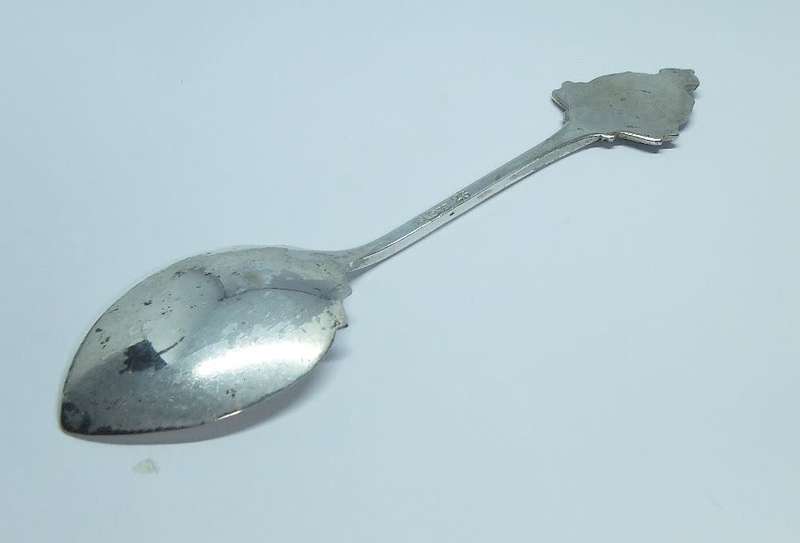 A vintage commemorative silverplate teaspoon made for the R.M.S Garth Castle - Union Castle