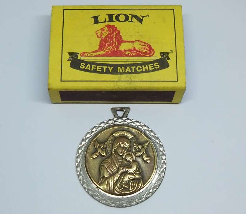 An amazing detailed vintage Italian made solid metal religious medallion