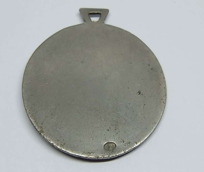 An amazing detailed vintage Italian made solid metal religious medallion
