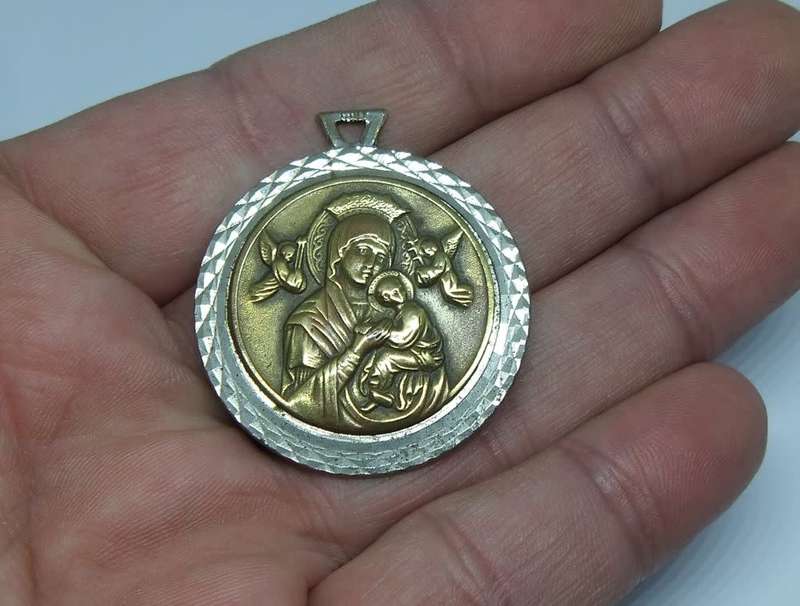 An amazing detailed vintage Italian made solid metal religious medallion