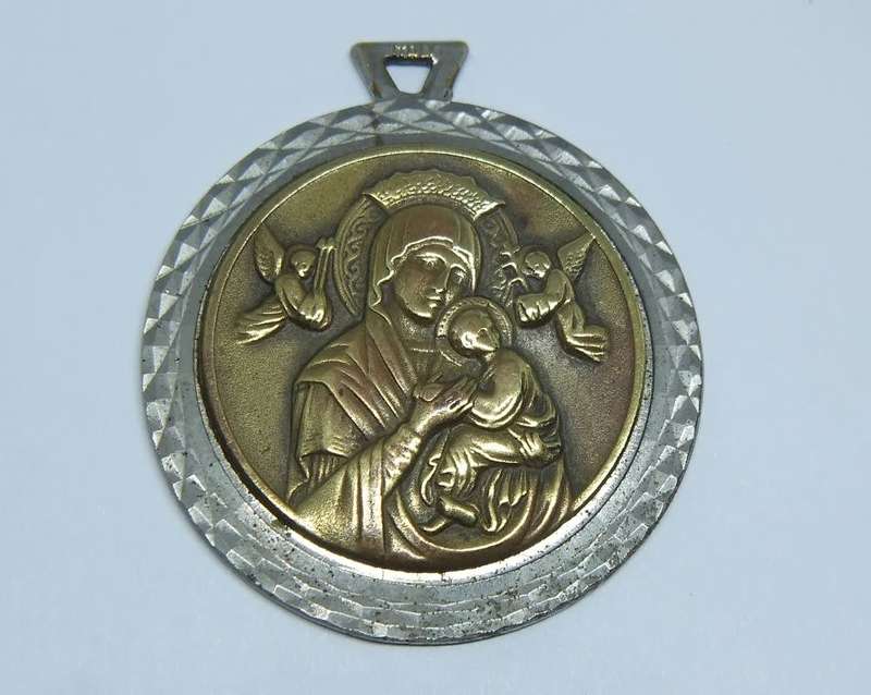 An amazing detailed vintage Italian made solid metal religious medallion