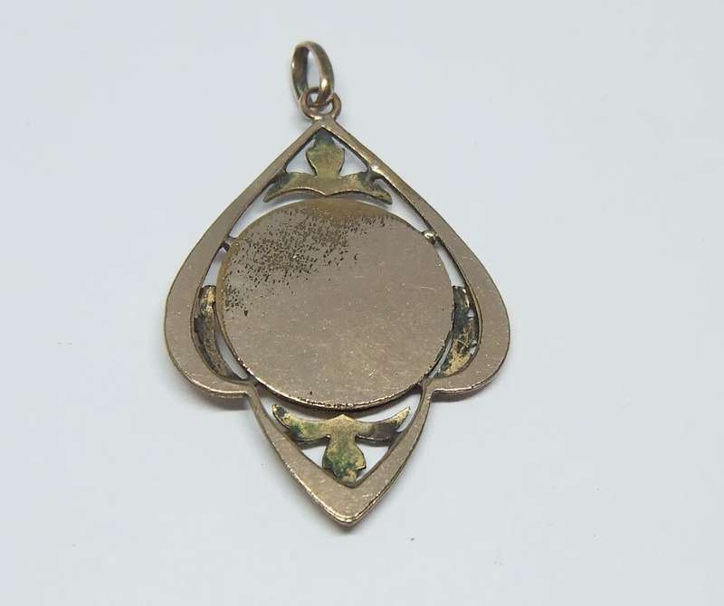 A beautiful Art Nouveau period look religious pendant / medallion