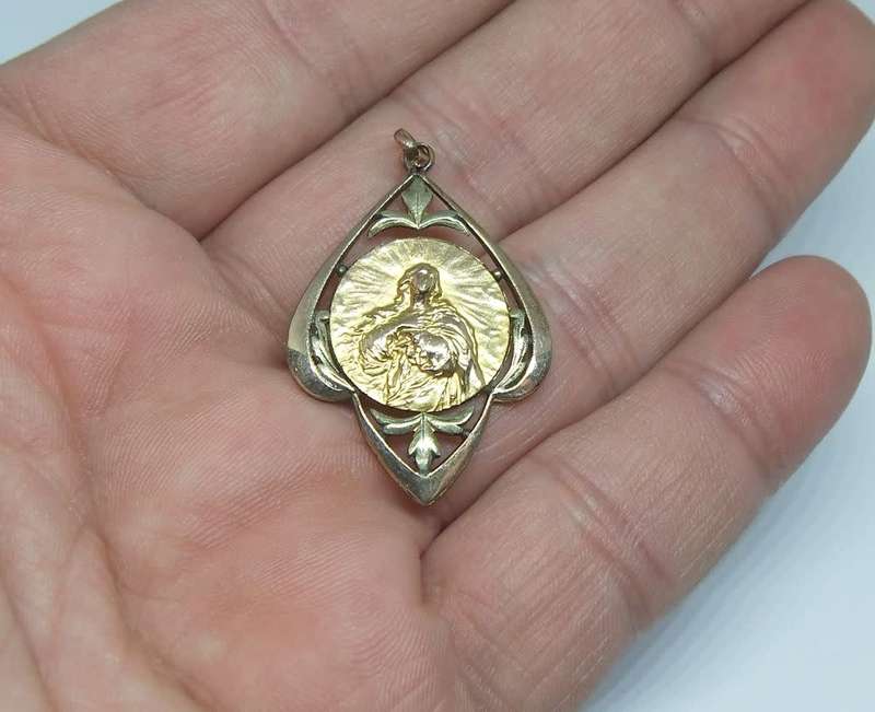 A beautiful Art Nouveau period look religious pendant / medallion