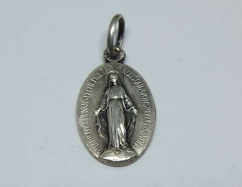 An insanely cute highly detailed vintage solid metal religious pendant / medallion made in France