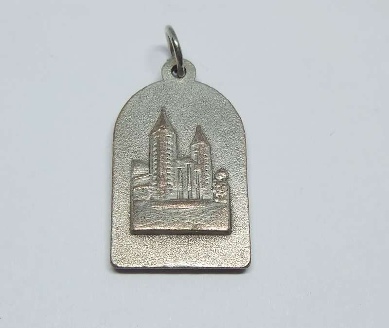 An interesting vintage solid metal religious pendant / medallion