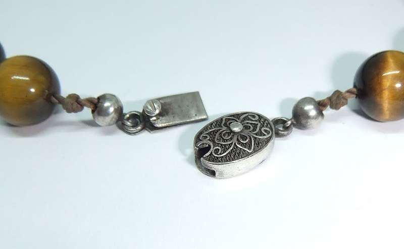 A rarely seen vintage genuine Tigers Eye gemstone orb necklace with a beautiful silver clasp
