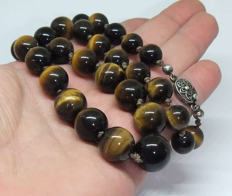 A rarely seen vintage genuine Tigers Eye gemstone orb necklace with a beautiful silver clasp