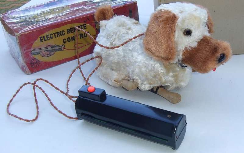 An awesome vintage Winky the Pup remote control dog , barking and begging with electric eyes