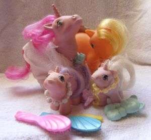 FOUR ORIGINAL MY LITTLE PONIES FROM THE 1980S WITH ACCESSORIES