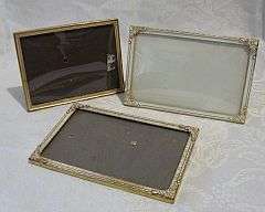 Three vintage frames with domed glass