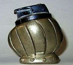 Cool !! Carol Boyes electronic table lighter