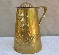 A spectacular antique solid brass lidded ewer by JS&S 1890-1910