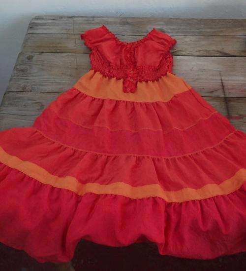 Very pretty orange and yellow dress with smocking and button detail, 4 - 5 yrs