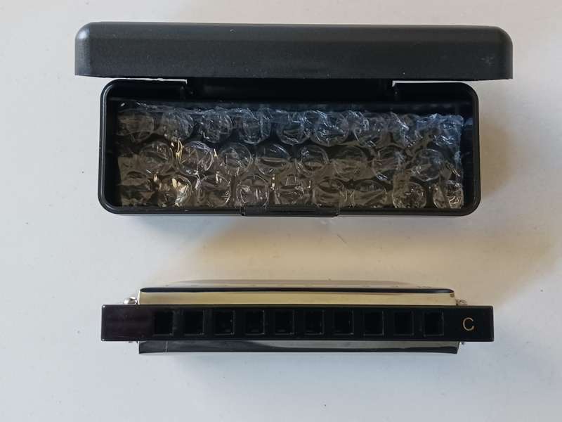Harmonica in C  - Collectible with company name Good - Year on top. ( NM )