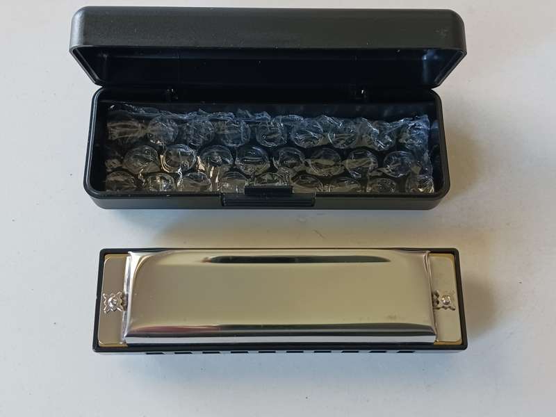 Harmonica in C  - Collectible with company name Good - Year on top. ( NM )