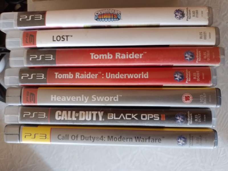 Ps3 Super Slim, remotes, games and Skylanders set