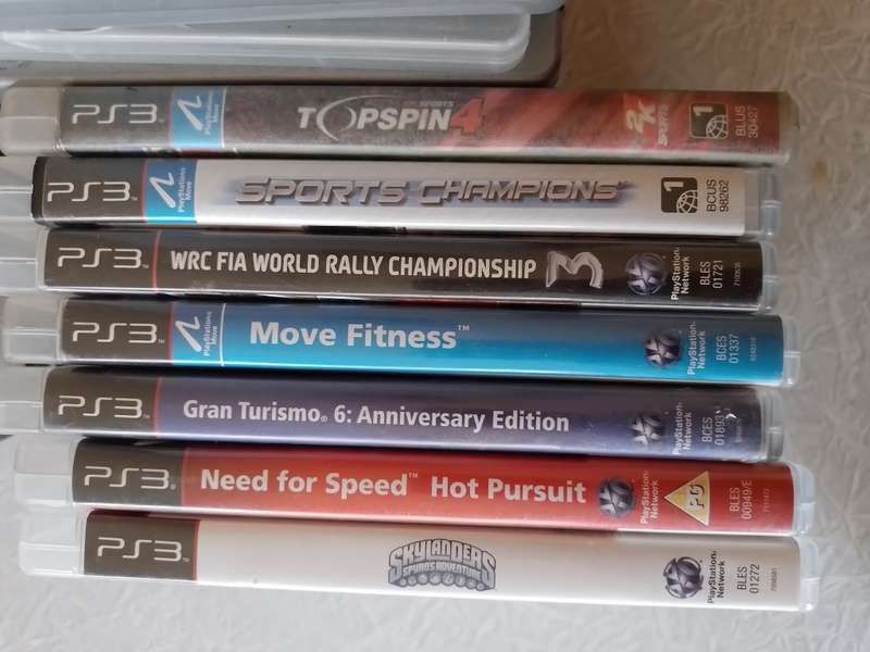 Ps3 Super Slim, remotes, games and Skylanders set