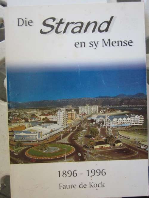 Die Strand en sy Mense 1896-1996-  Faure de Kock - sagteband het n paar klein merkies