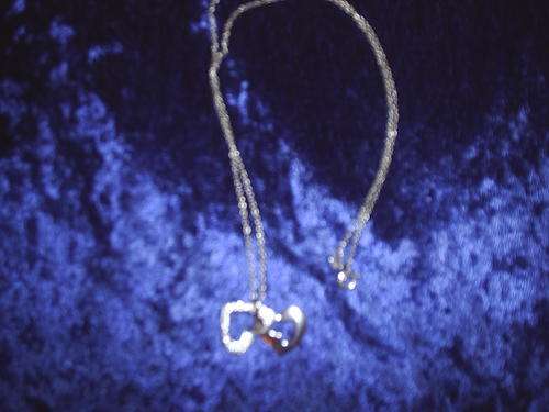 Silver necklace with double hart shaped pendant