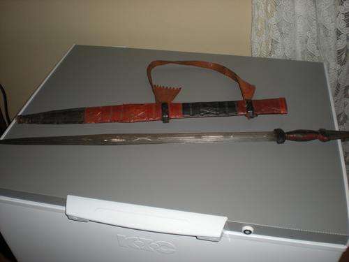 Ceremonial sword taken from Janjaweed soldier in Sudan with camel leather sheath