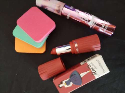Makeup combo. Lips, mascara and makeup applicator