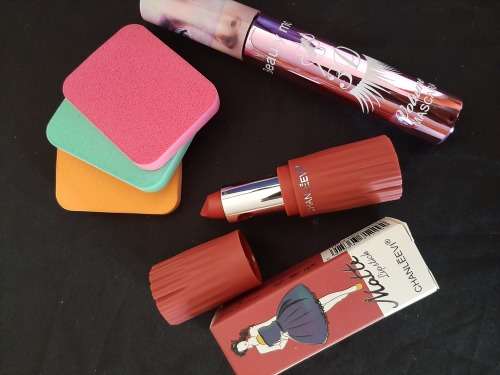 Makeup combo. Lips, mascara and makeup applicator