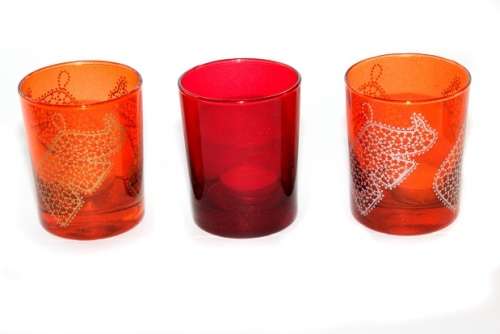 Consol coloured tumbler glasses with etchings and tea light candle as gift