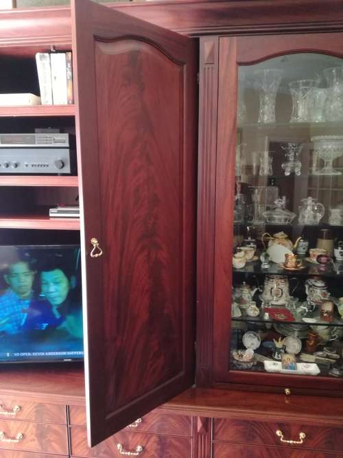 Solid Mahogany Display Unit. Retractable desk surfaces and doors. Could be white washed for kitchen