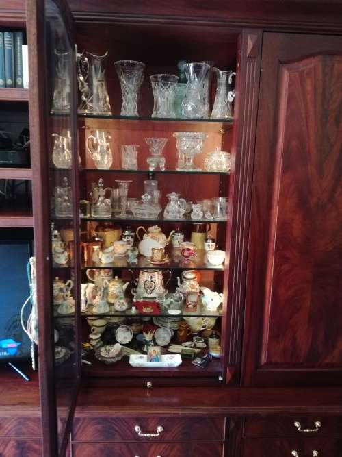 Solid Mahogany Display Unit. Retractable desk surfaces and doors. Could be white washed for kitchen