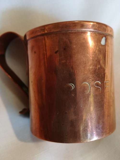 A pair of 19th Century Copper Measuring jugs