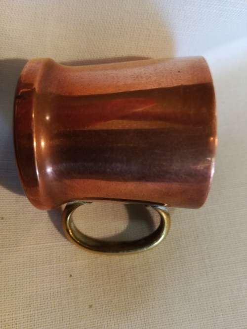A pair of 19th Century Copper Measuring jugs