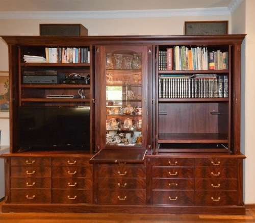 Solid Mahogany Display Unit. Retractable desk surfaces and doors. Could be white washed for kitchen