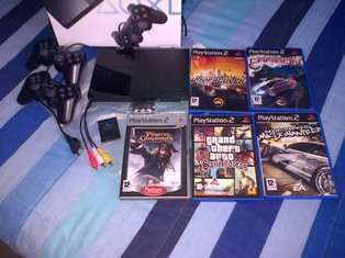 Combo deal - Sony PS2 + 2 controls + 8mb card + 5 awesome games (as good as new)