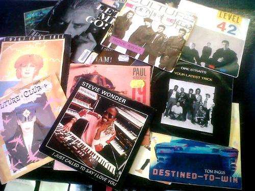 30 International singles with cover sleeves