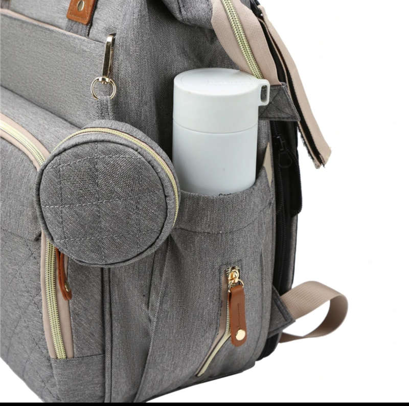 Multi-functional baby diaper bag & Bed