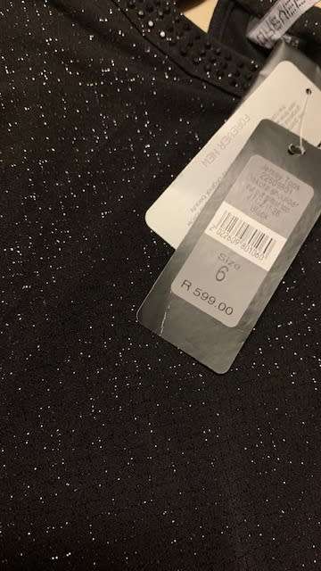 TOP - FORMAL - LADIES - GLITTER - SIZE 6 MORE LIKE A SIZE 8 - NEW STILL HAS TAGS - COLD SHOULDER