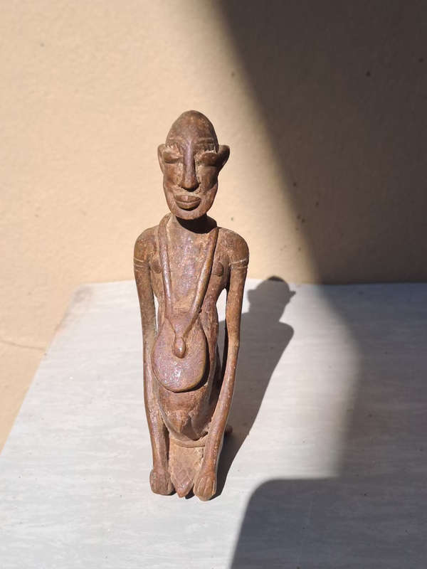 African Mali dogon figurine of a kneeling man bronze