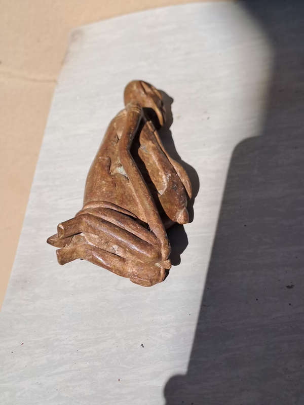 African Mali dogon figurine of a kneeling man bronze