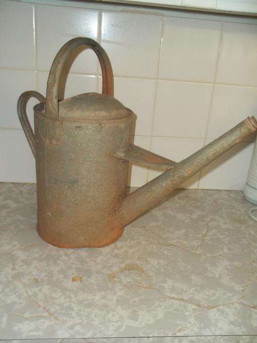ONE AND A HALF G WATERING CAN