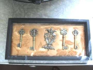 FRAMED BRASS JEWELLED KEYS