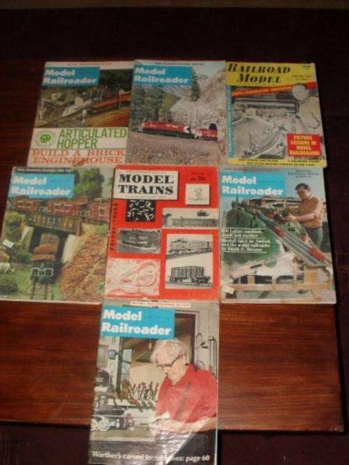 7 COLLECTABLE RAILROAD BOOKS