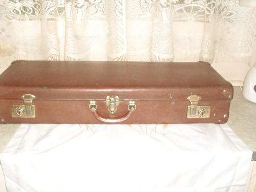 OLD SUITCASE FOR A MUSICAL INSTRUMENT