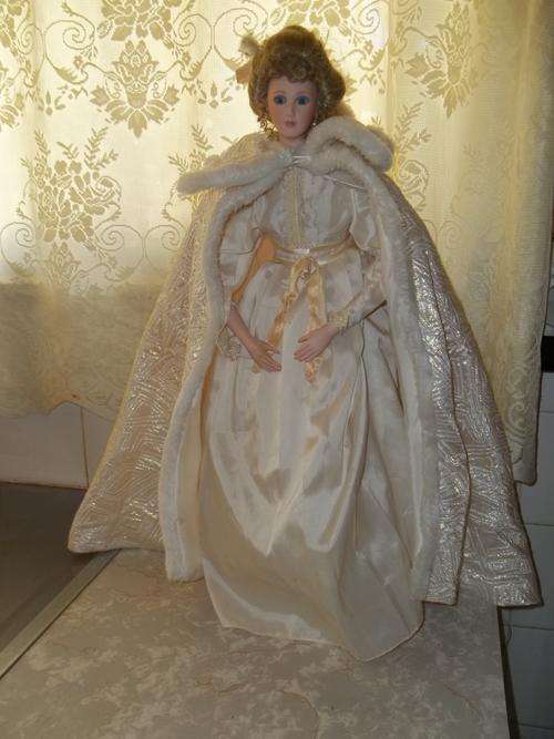 STUNNING LARGE PORCELAIN DOLL.